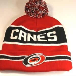 Canes PNC Red/Blk Striped Pom Pom Beanie Cap